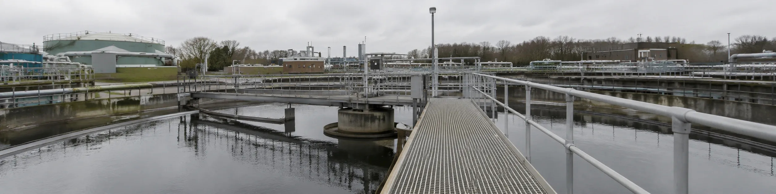 Water treatment facility with GRP walkways and access platforms for utility infrastructure.