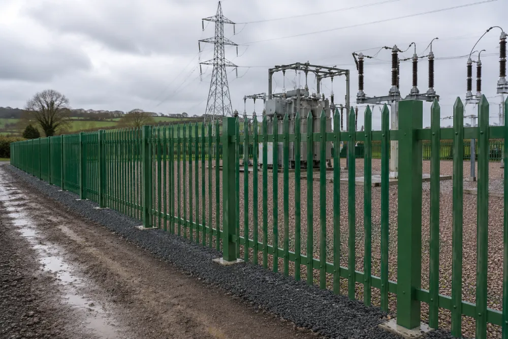 Non-conductive GRP security fencing installed around a National Grid electrical substation, providing safe perimeter protection near high-voltage infrastructure.